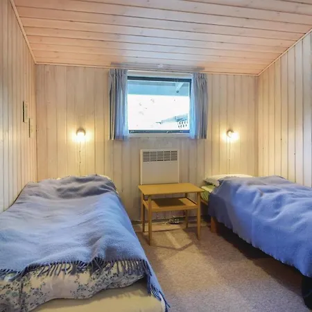 Three-bedroom In Hébergement de vacances *